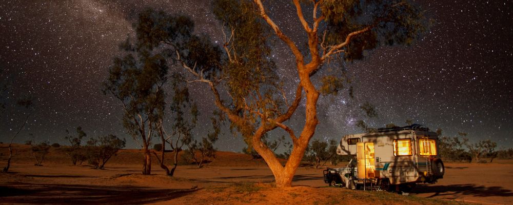Caravan in the outback under the stars